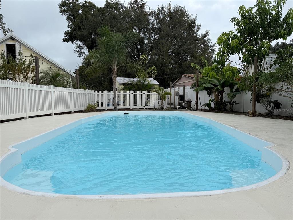 6501 Matchett Road Belle Isle, FL 32809 - Photo 41 of 43 a view of a swimming pool with a house