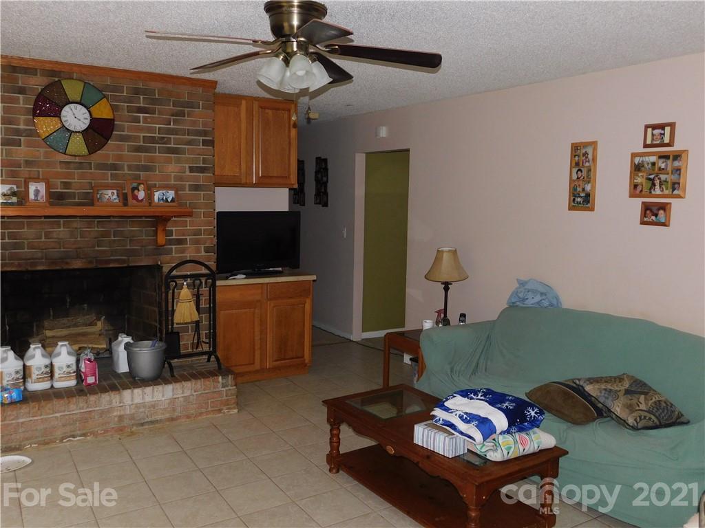 1835 Sharon Road York, SC 29745 - Photo 11 of 21 a living room with furniture and a flat screen tv