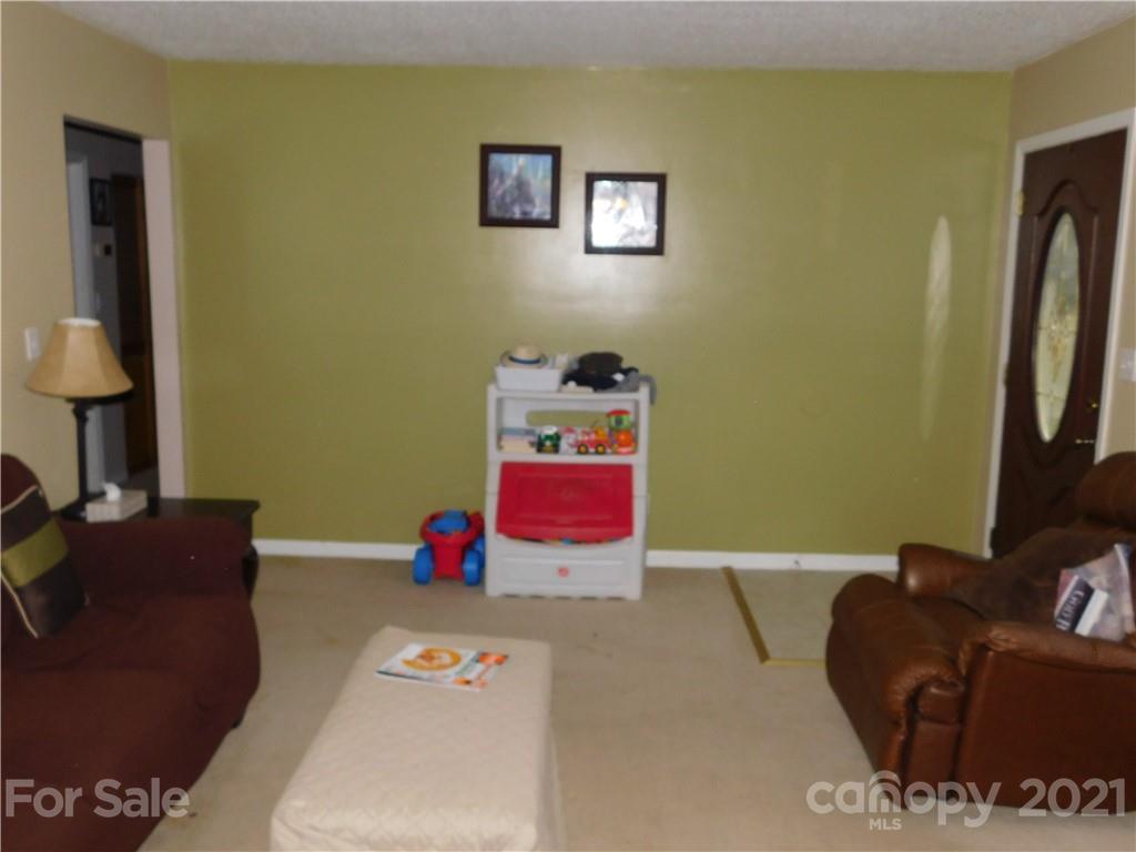 1835 Sharon Road York, SC 29745 - Photo 13 of 21 a living room with furniture and a flat screen tv