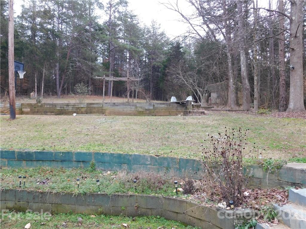 1835 Sharon Road York, SC 29745 - Photo 19 of 21 a backyard of a house with lots of green space