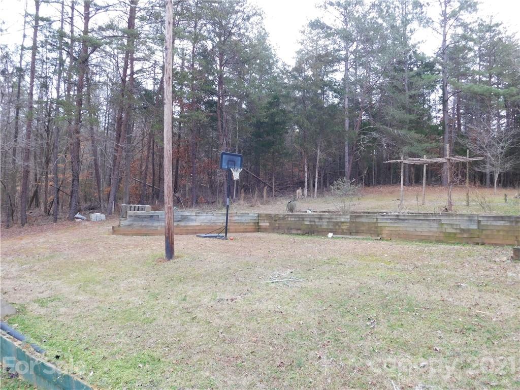 1835 Sharon Road York, SC 29745 - Photo 21 of 21 a backyard of a house with lots of green space