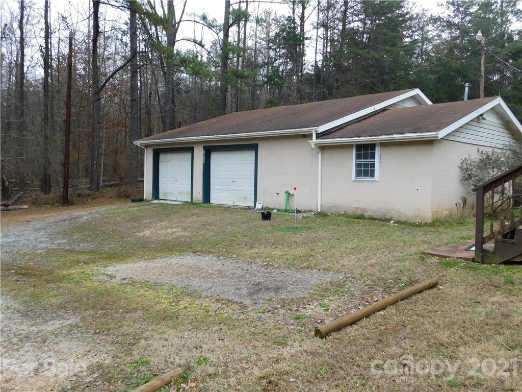 1835 Sharon Road York, SC 29745 - Photo 4 of 21 a house that has a tree in front of the house