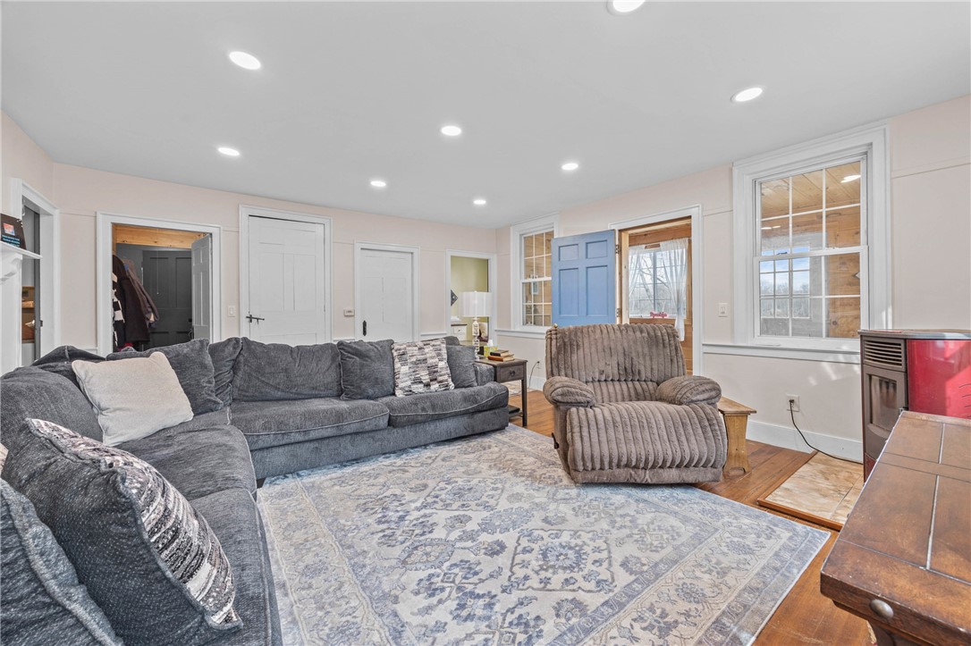 2385 Dow Road York, NY 14533 - Photo 15 of 43 Family Room offers easy flow with doors leading to
