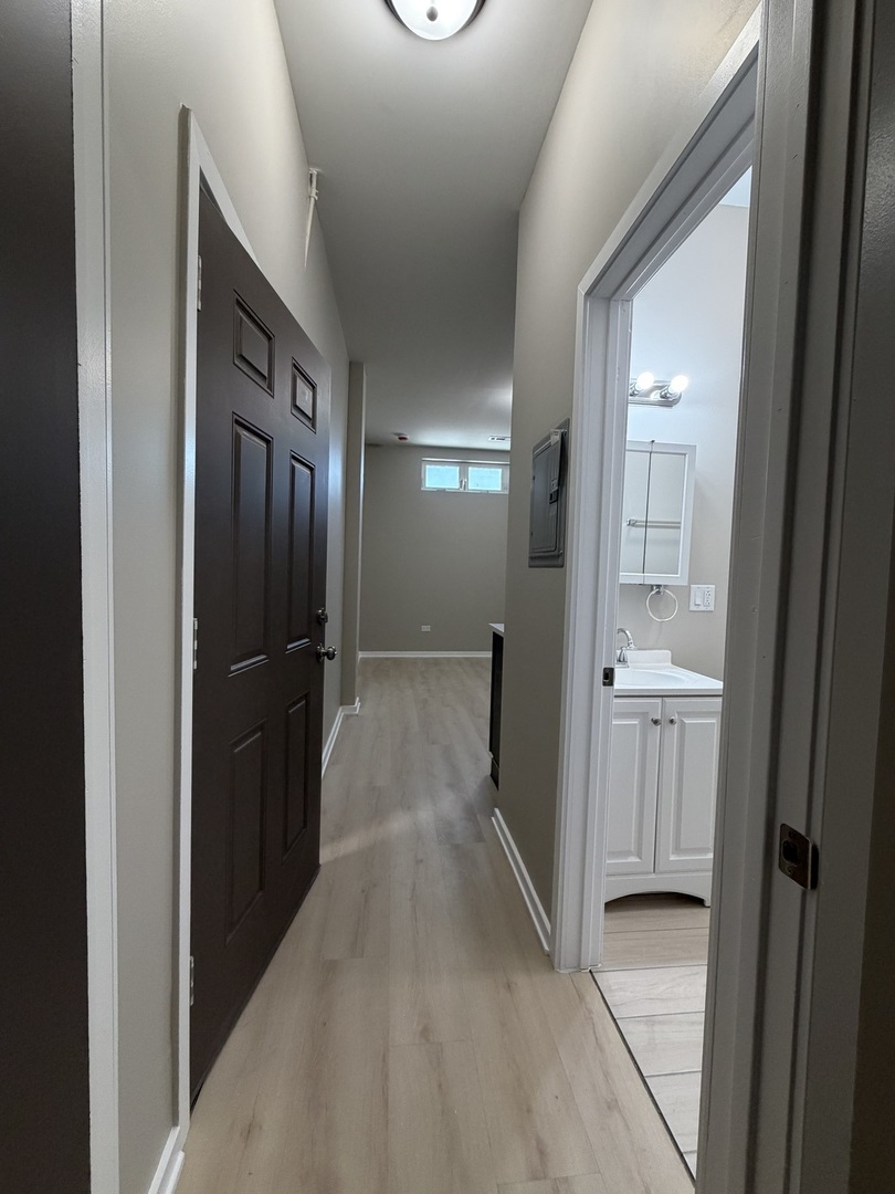 24 North Pulaski Road, Unit 1F Chicago, IL 60624 - Photo 10 of 10 a view of a hallway