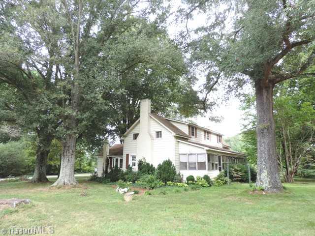 5912 Pepper Road Oak Ridge, NC 27310 - Photo 1 of 15 Exterior Front. Charming turn of the century cottage with renovations already started. 6.47 Acre in "Horsey" Oak Ridge!