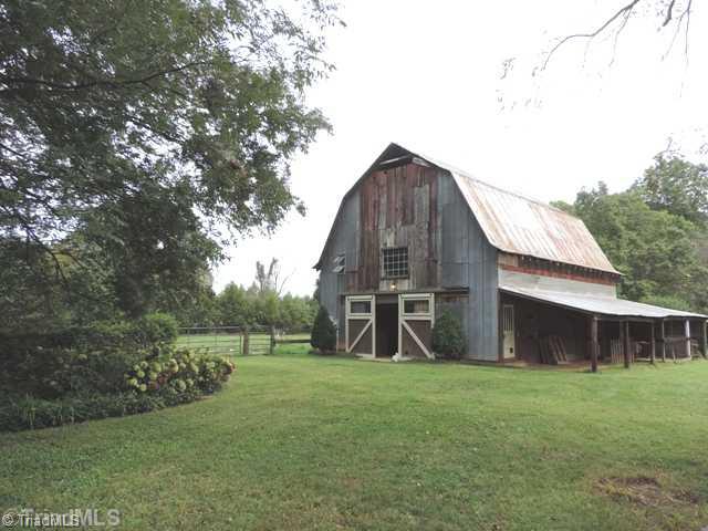 5912 Pepper Road Oak Ridge, NC 27310 - Photo 3 of 15 Stable/Barn. Three story barn where first level has been renovated.