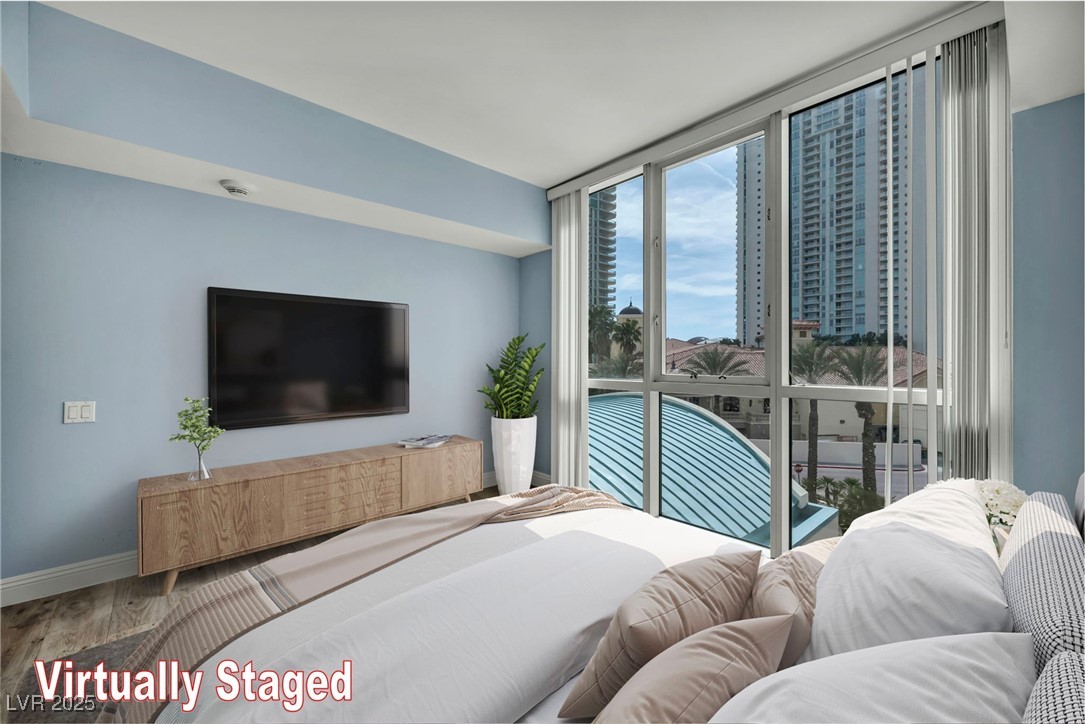 2777 Paradise Road, Unit 301 Las Vegas, NV 89109 - Photo 11 of 36 Second bedroom ensuite, virtually staged