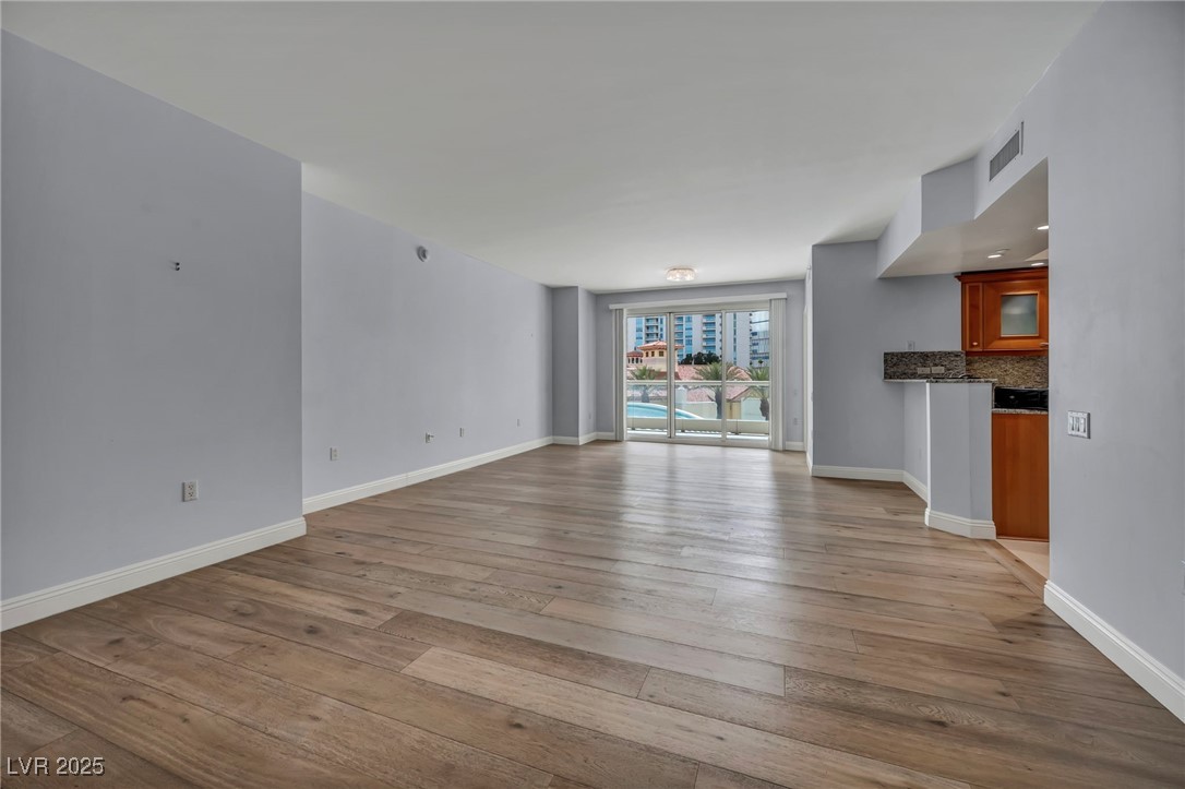 2777 Paradise Road, Unit 301 Las Vegas, NV 89109 - Photo 15 of 36 Great Room/Dining with exit to Balcony