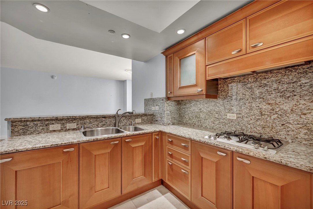 2777 Paradise Road, Unit 301 Las Vegas, NV 89109 - Photo 18 of 36 Custom Cabinets, Pull-out faucet and reverse osmosis
