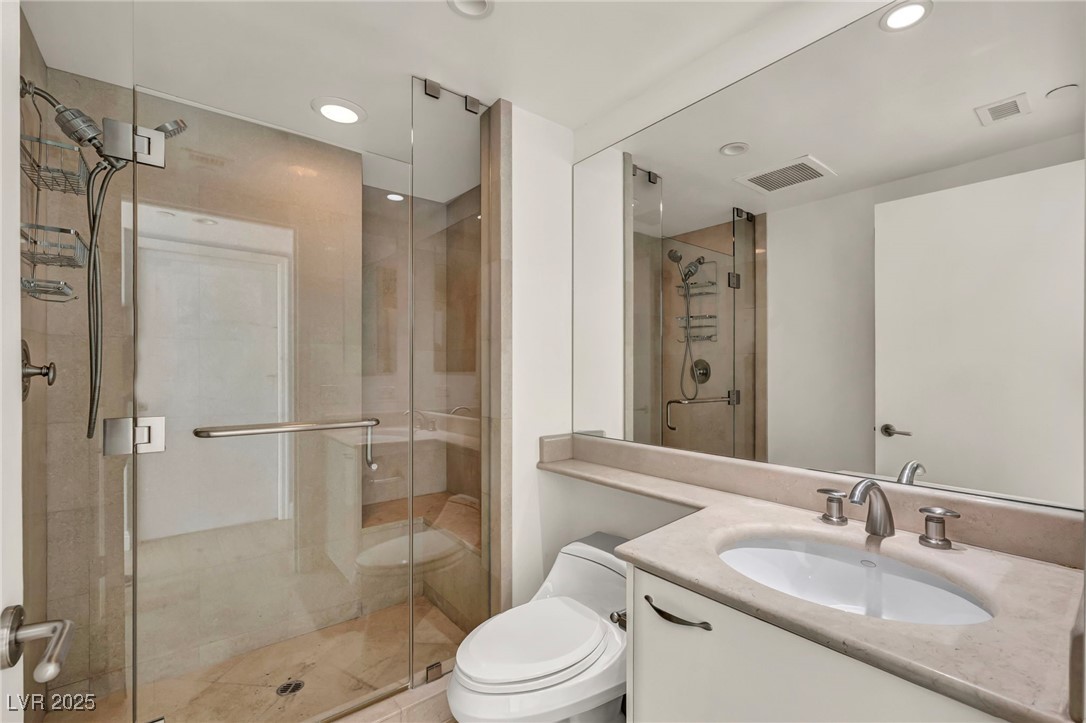2777 Paradise Road, Unit 301 Las Vegas, NV 89109 - Photo 19 of 36 2nd Bedroom with oversized shower in bath