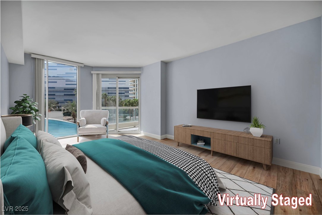 2777 Paradise Road, Unit 301 Las Vegas, NV 89109 - Photo 7 of 36 Primary bedroom, virtually staged with large walk-in closet