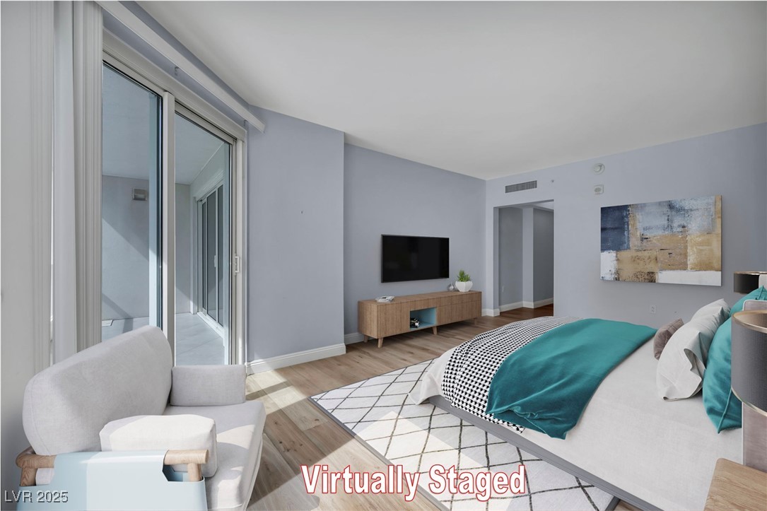 2777 Paradise Road, Unit 301 Las Vegas, NV 89109 - Photo 8 of 36 Primary bedroom, virtually staged