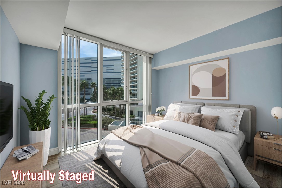 2777 Paradise Road, Unit 301 Las Vegas, NV 89109 - Photo 10 of 36 Second bedroom, virtually staged with bath and closet