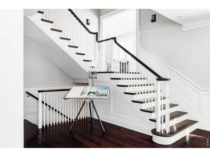 a view of entryway with wooden floor
