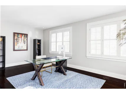 a workspace with wooden floor