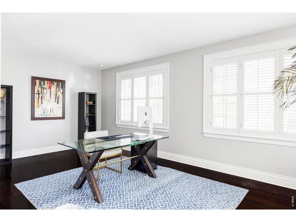 a workspace with wooden floor