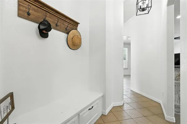 a kitchen with a sink cabinets and window