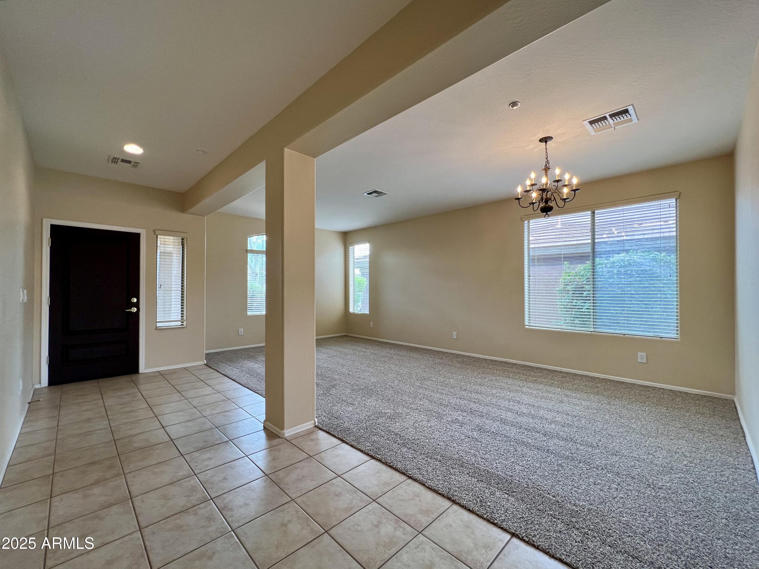 41018 North Prestancia Way Anthem, AZ 85086 - Photo 10 of 29 a view of a hallway with a window