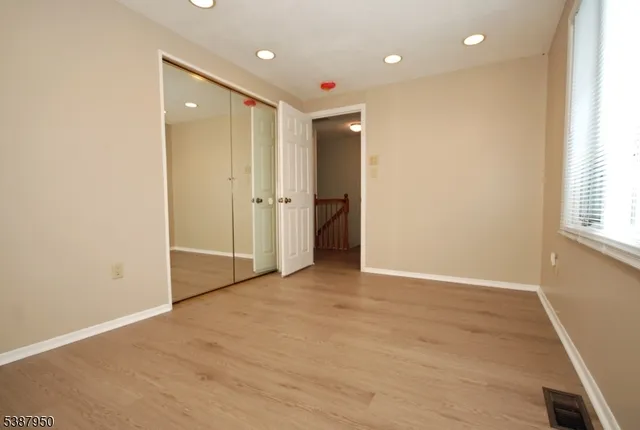 a view of balcony with furniture