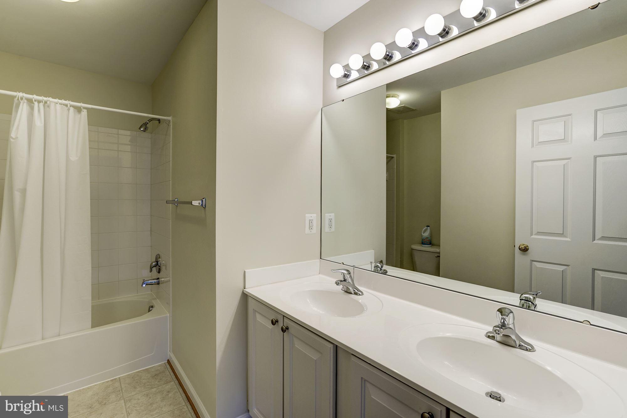 11709 Kahns Road Manassas, VA 20112 - Photo 22 of 30 Hall Bathroom in Upper Level