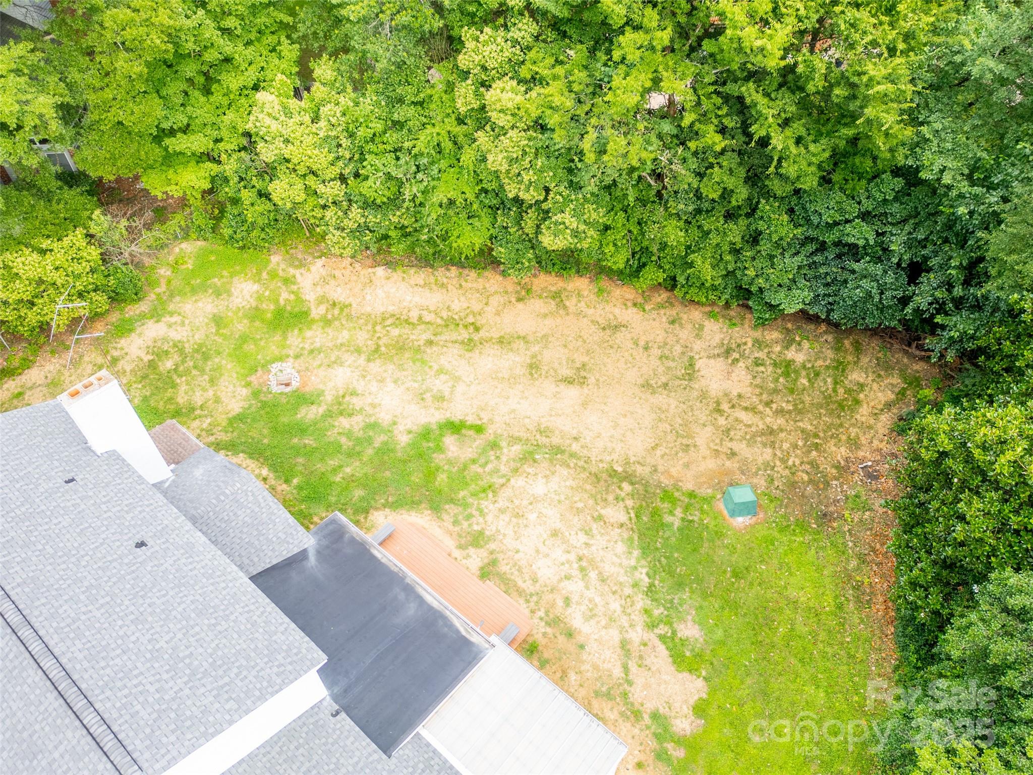 1728 Colony Road Salisbury, NC 28144 - Photo 14 of 20 a view of a yard with plants and wooden fence
