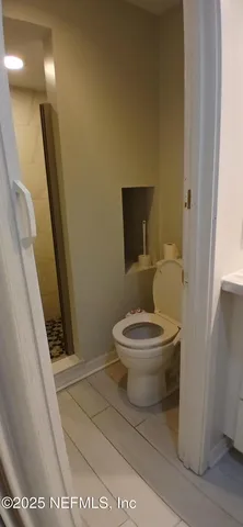 a kitchen with stainless steel appliances a refrigerator and a stove