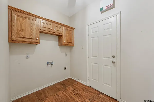 a view of a kitchen with wooden floor