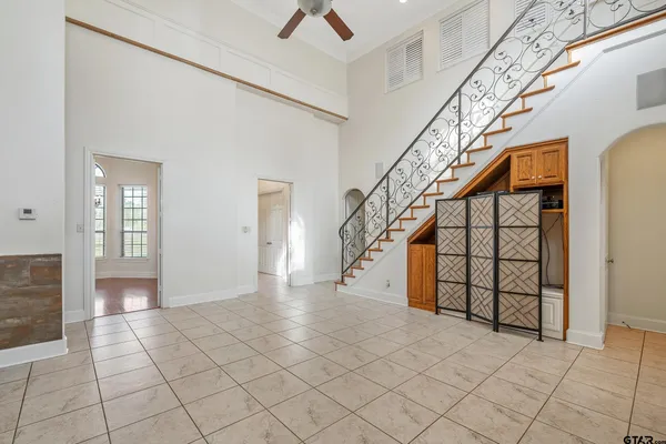 a view of entryway and hall with a window