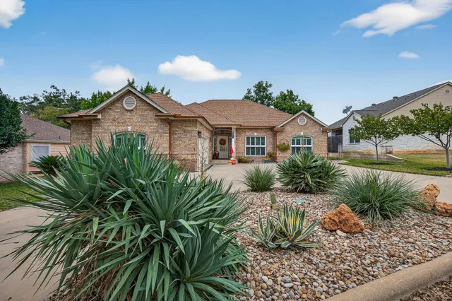 a front view of a house with a shower
