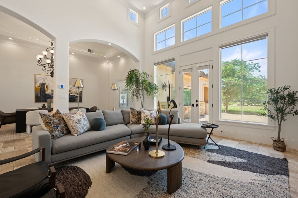 102 Long Point Cove Georgetown, TX 78628 - Photo 16 of 36 a living room with furniture and a large window