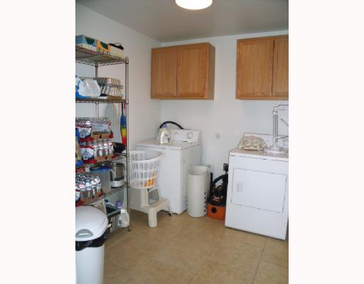 210 Oak Ridge Drive Corpus Christi, TX 78418 - Photo 7 of 10 a room with storage and utility