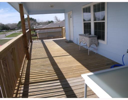 210 Oak Ridge Drive Corpus Christi, TX 78418 - Photo 9 of 10 a view of balcony with wooden floor