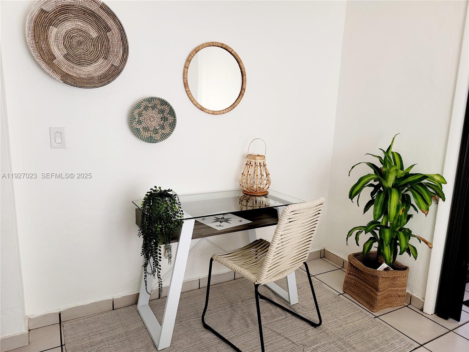 1872 Southwest 9th Street Miami, FL 33135 - Photo 18 of 48 a table with a potted plant and a table