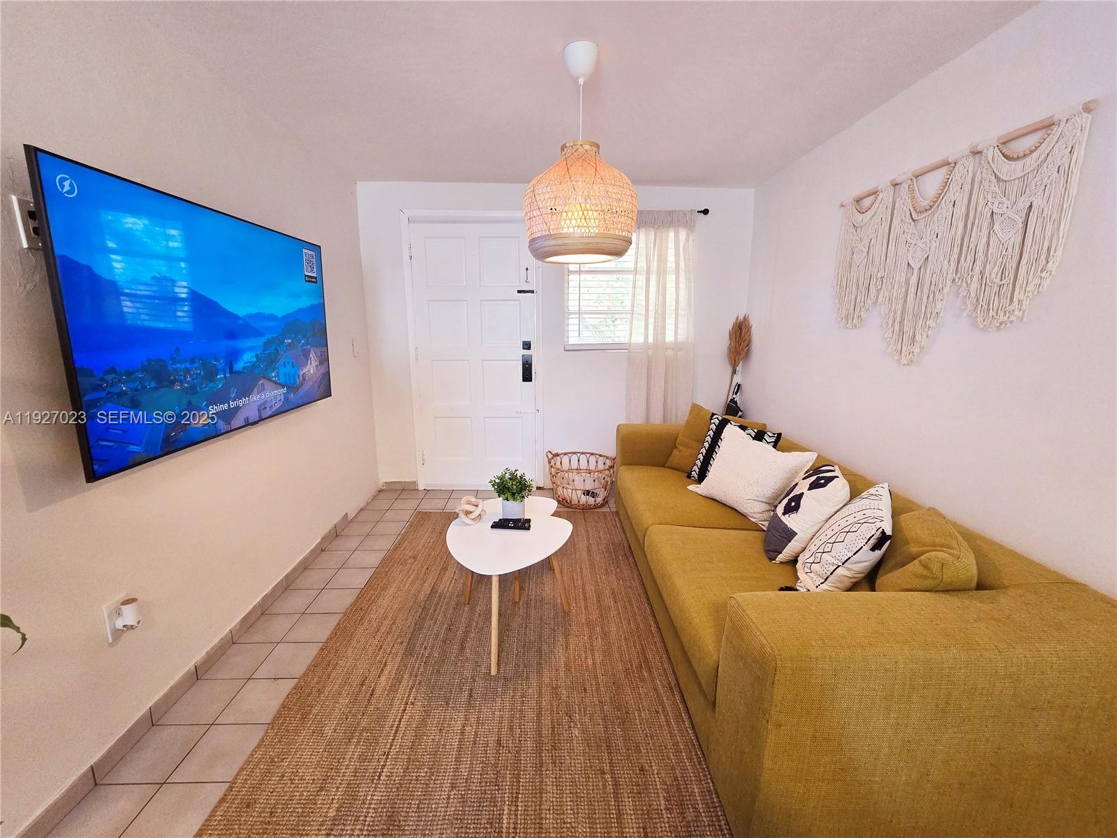 1872 Southwest 9th Street Miami, FL 33135 - Photo 31 of 48 a living room with furniture and wooden floor