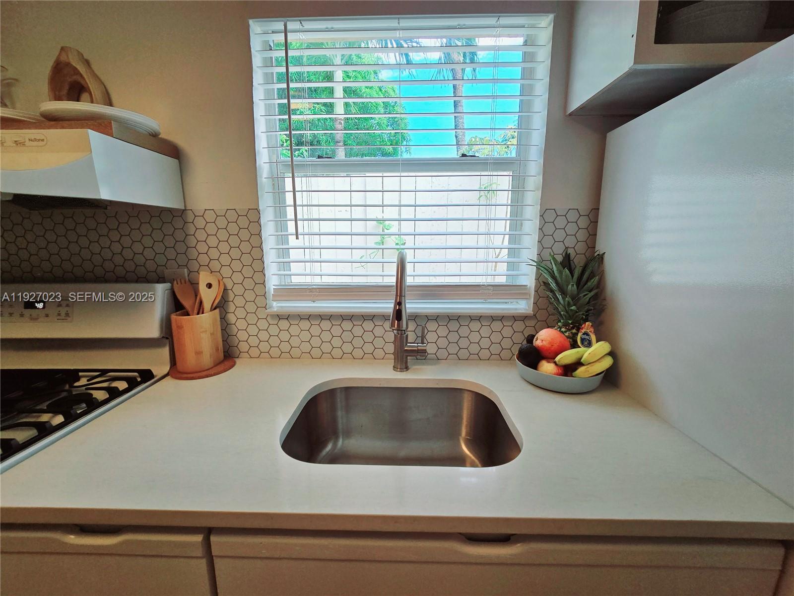 1872 Southwest 9th Street Miami, FL 33135 - Photo 35 of 48 a kitchen with a sink and a window