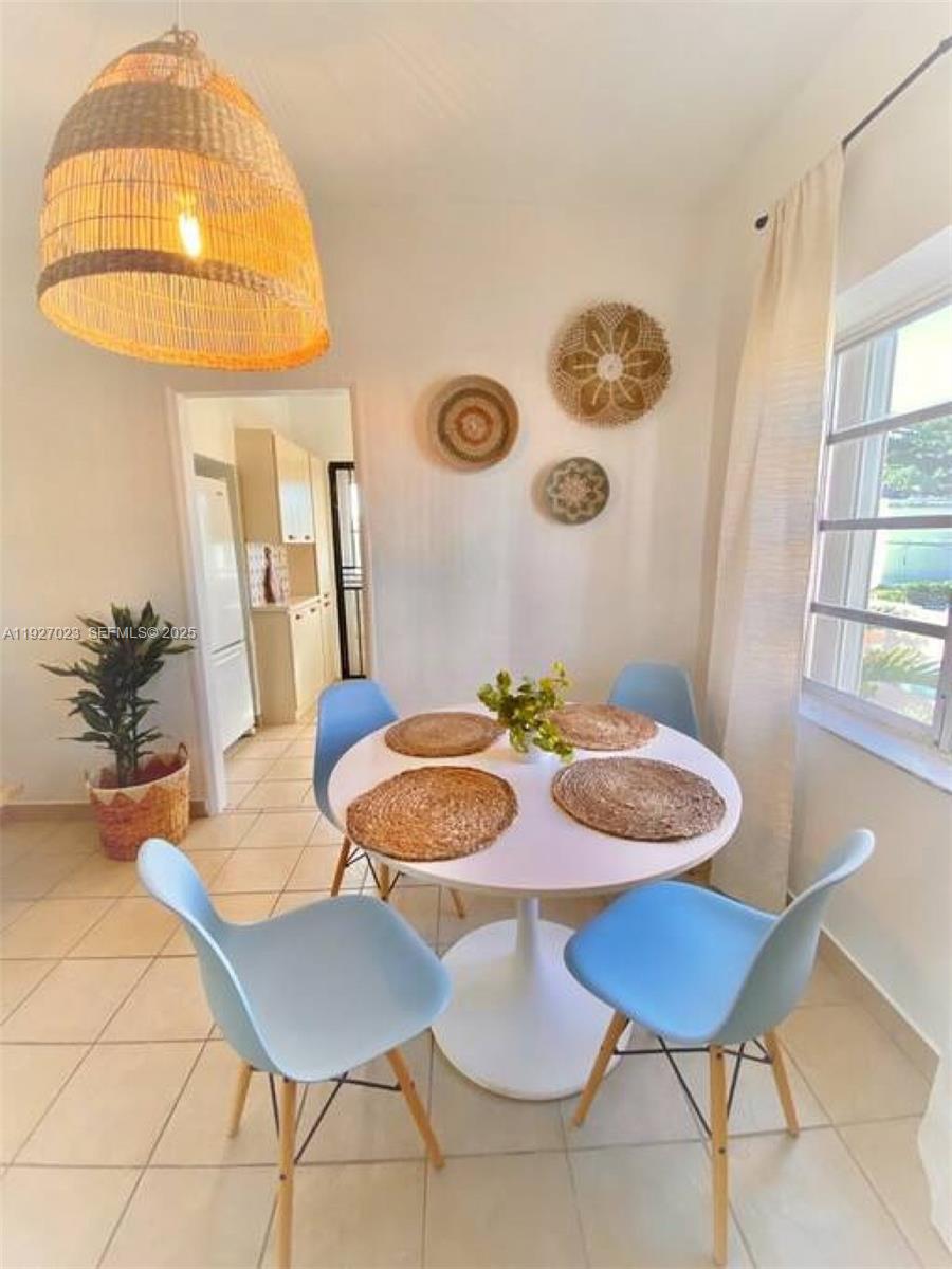 1872 Southwest 9th Street Miami, FL 33135 - Photo 4 of 48 a dining room with furniture and wooden floor