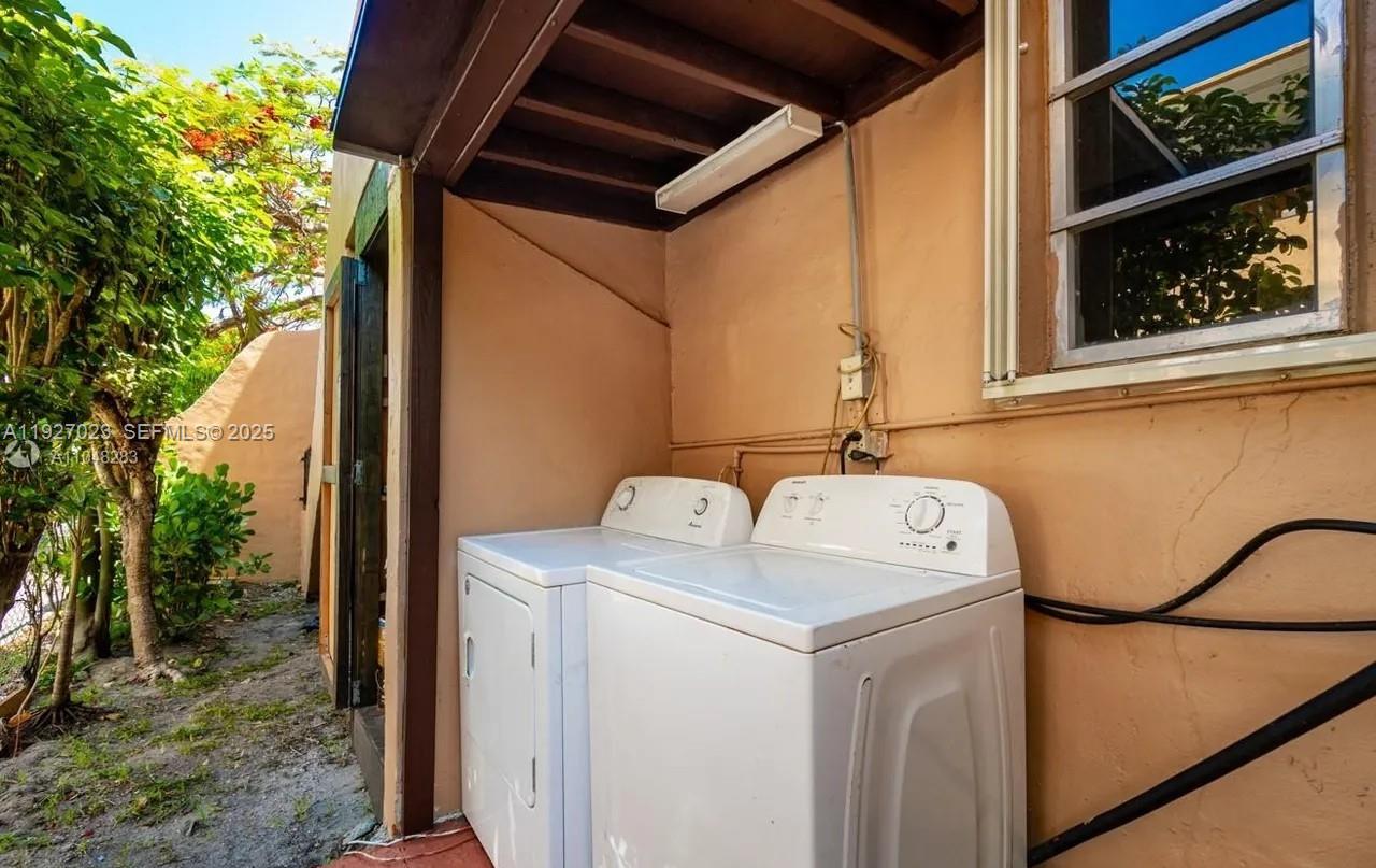 1872 Southwest 9th Street Miami, FL 33135 - Photo 43 of 48 a utility room with dryer and washer