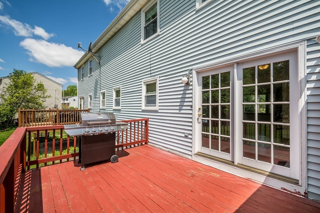 2 Fred Dolan Circle, Unit 2 Randolph, MA 02368 - Photo 3 of 25 a view of roof deck with couches chairs and potted plants