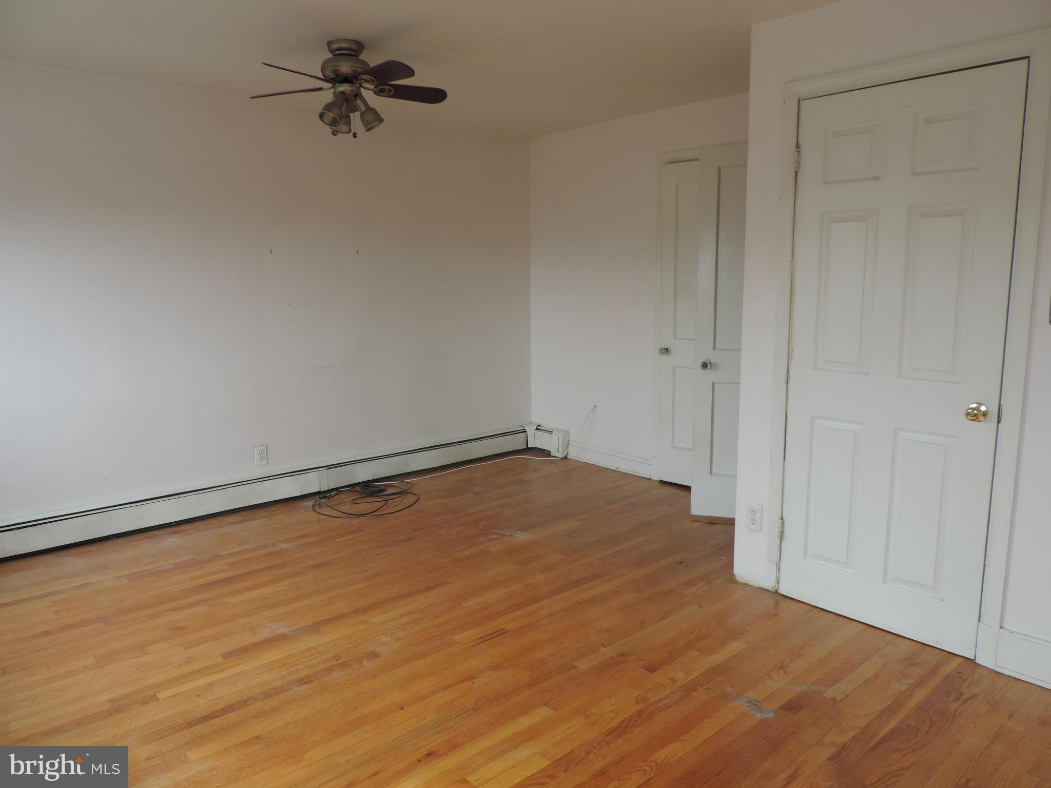 1124 Elm Road Baltimore, MD 21227 - Photo 11 of 13 a view of a room with an empty space