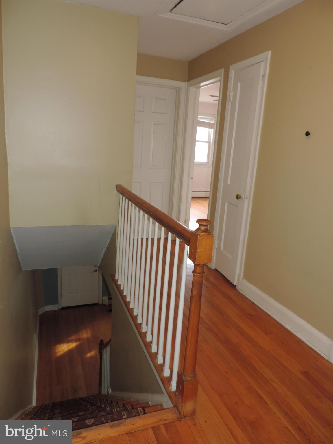 1124 Elm Road Baltimore, MD 21227 - Photo 13 of 13 a view of entryway with wooden floor