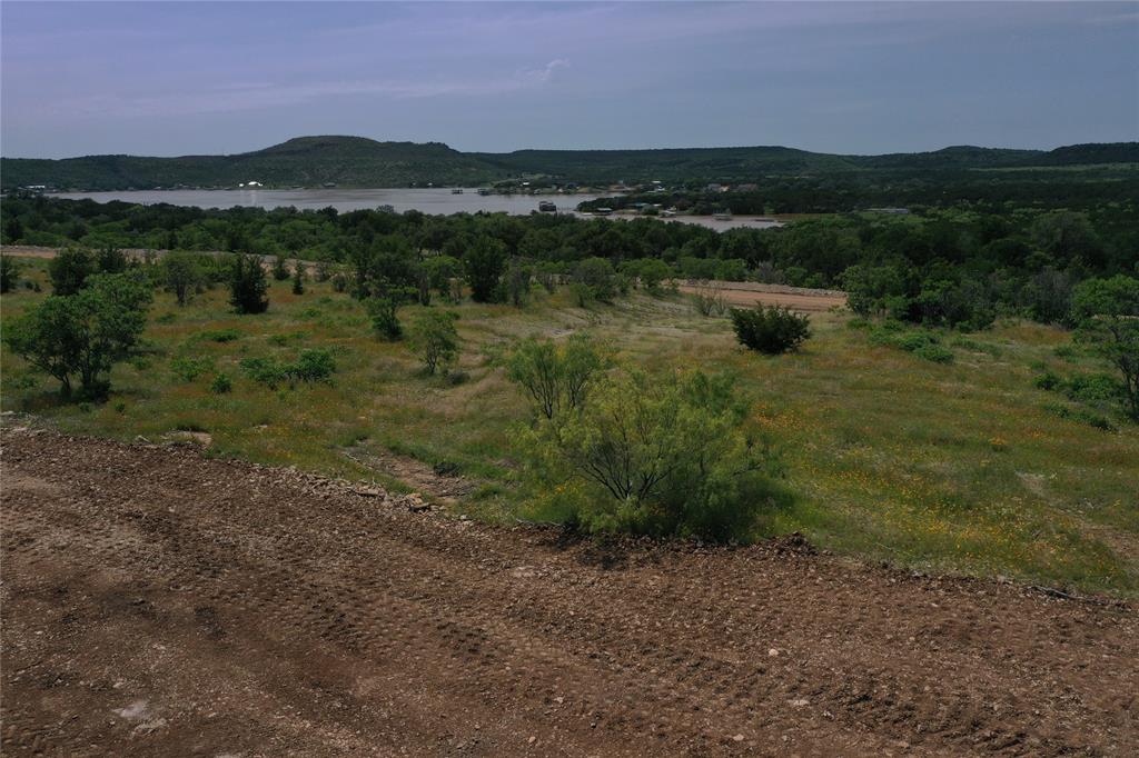 Lot 126 White Moon Road Graham, TX 76450 - Photo 2 of 40 a view of lake with mountain