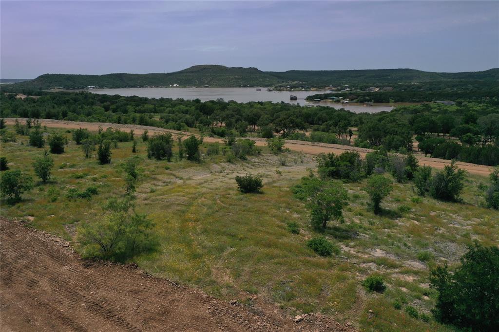 Lot 126 White Moon Road Graham, TX 76450 - Photo 25 of 40 a view of lake with mountain