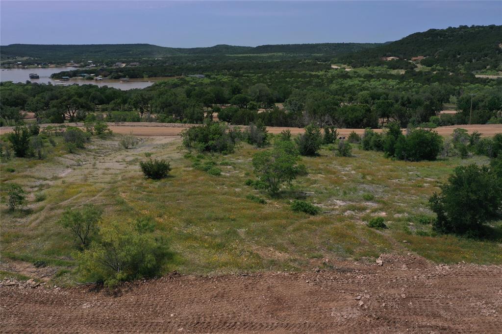 Lot 126 White Moon Road Graham, TX 76450 - Photo 26 of 40 a view of a town with mountains in the background