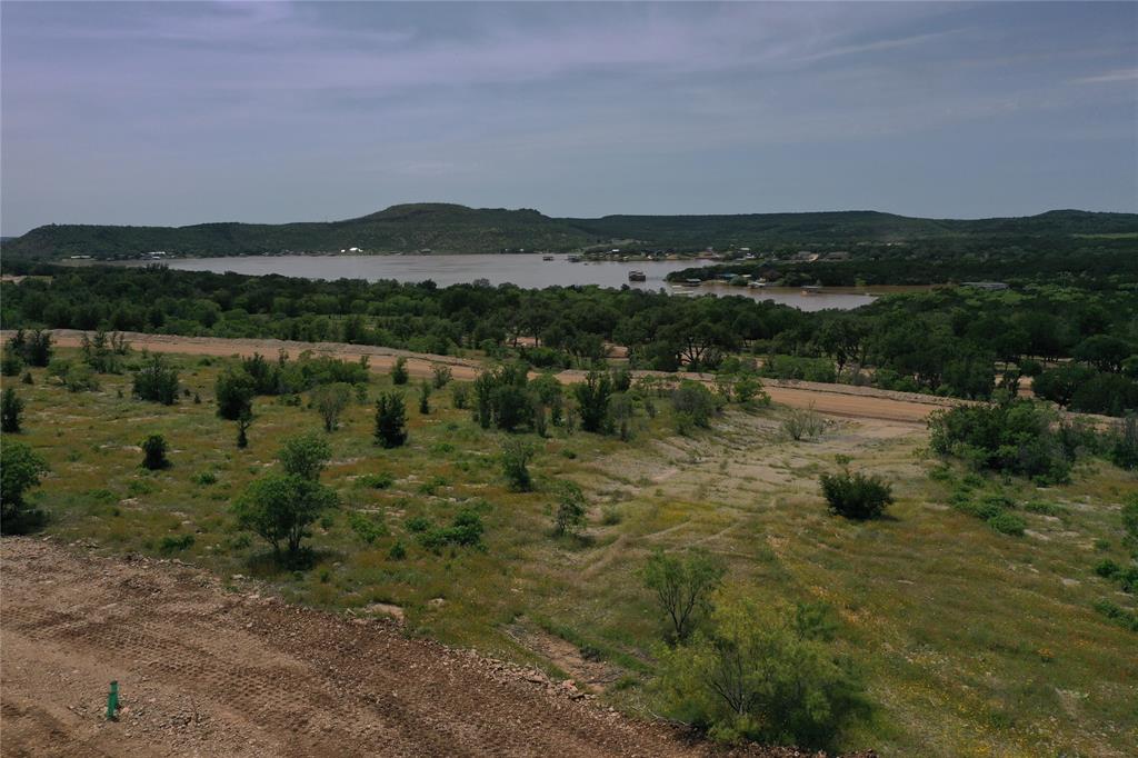 Lot 126 White Moon Road Graham, TX 76450 - Photo 28 of 40 a view of lake with mountain