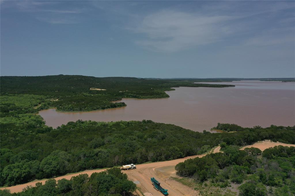 Lot 126 White Moon Road Graham, TX 76450 - Photo 37 of 40 a view of a lake with a city