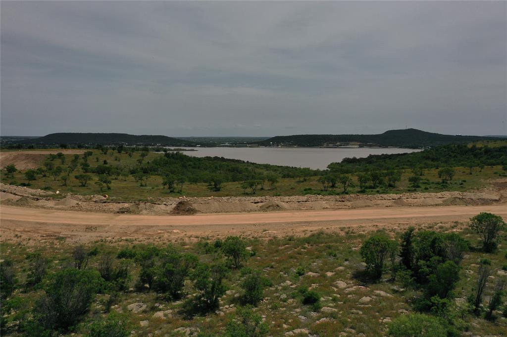 Lot 126 White Moon Road Graham, TX 76450 - Photo 39 of 40 a view of a lake with a mountain