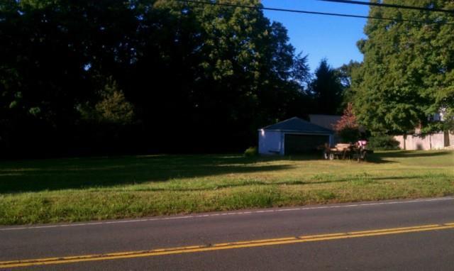 25 Dodgingtown Road Bethel, CT 06801 - Photo 1 of 1 a front view of a house with a yard