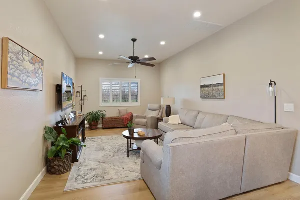 a living room with furniture and a window