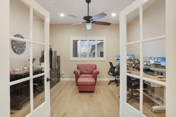 a bathroom with a double vanity sink mirror and shower