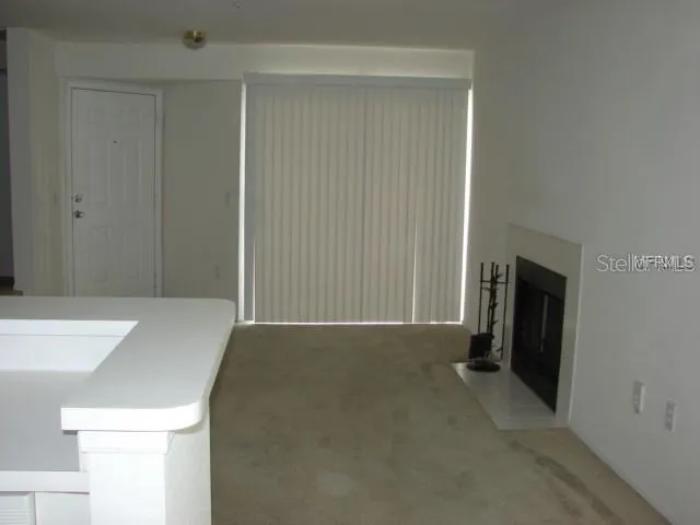 a view of a room with a hallway